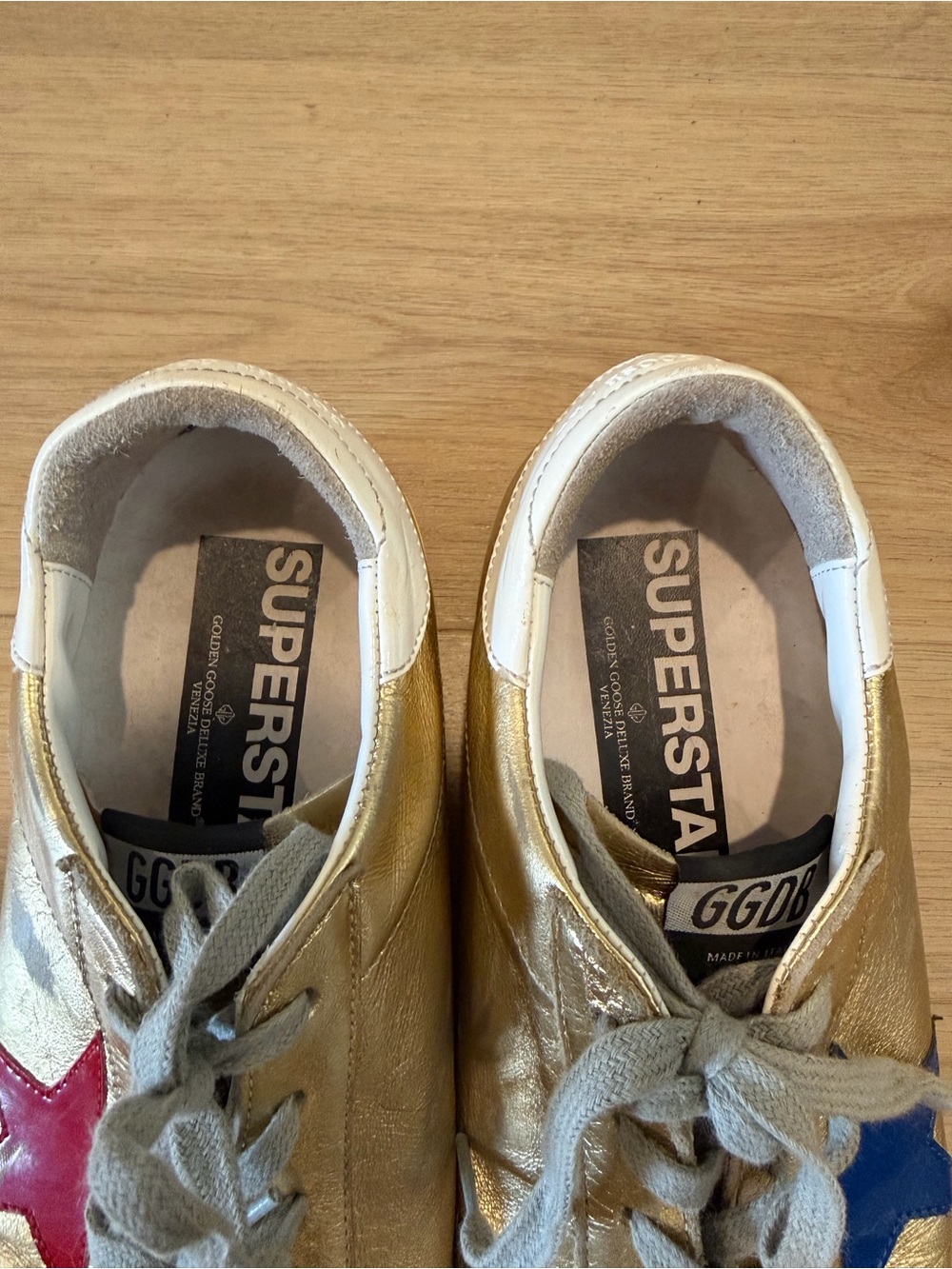 Golden Goose Metallic Gold Star Sneakers with Red and Blue Accents - Picture 4 of 6